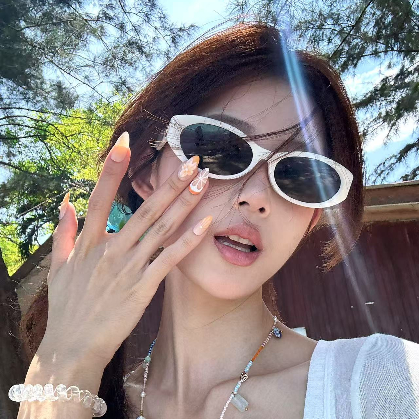 欧美椭圆白色墨镜女高级感2025新款防紫外线夏季显脸小时尚太阳镜