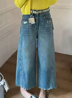 蓝色高腰弯刀牛仔裤女