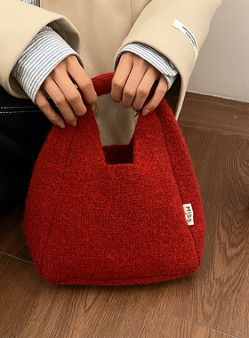 含羊毛高级感红色手提包女秋冬季2025新款韩版百搭大容量通勤包包