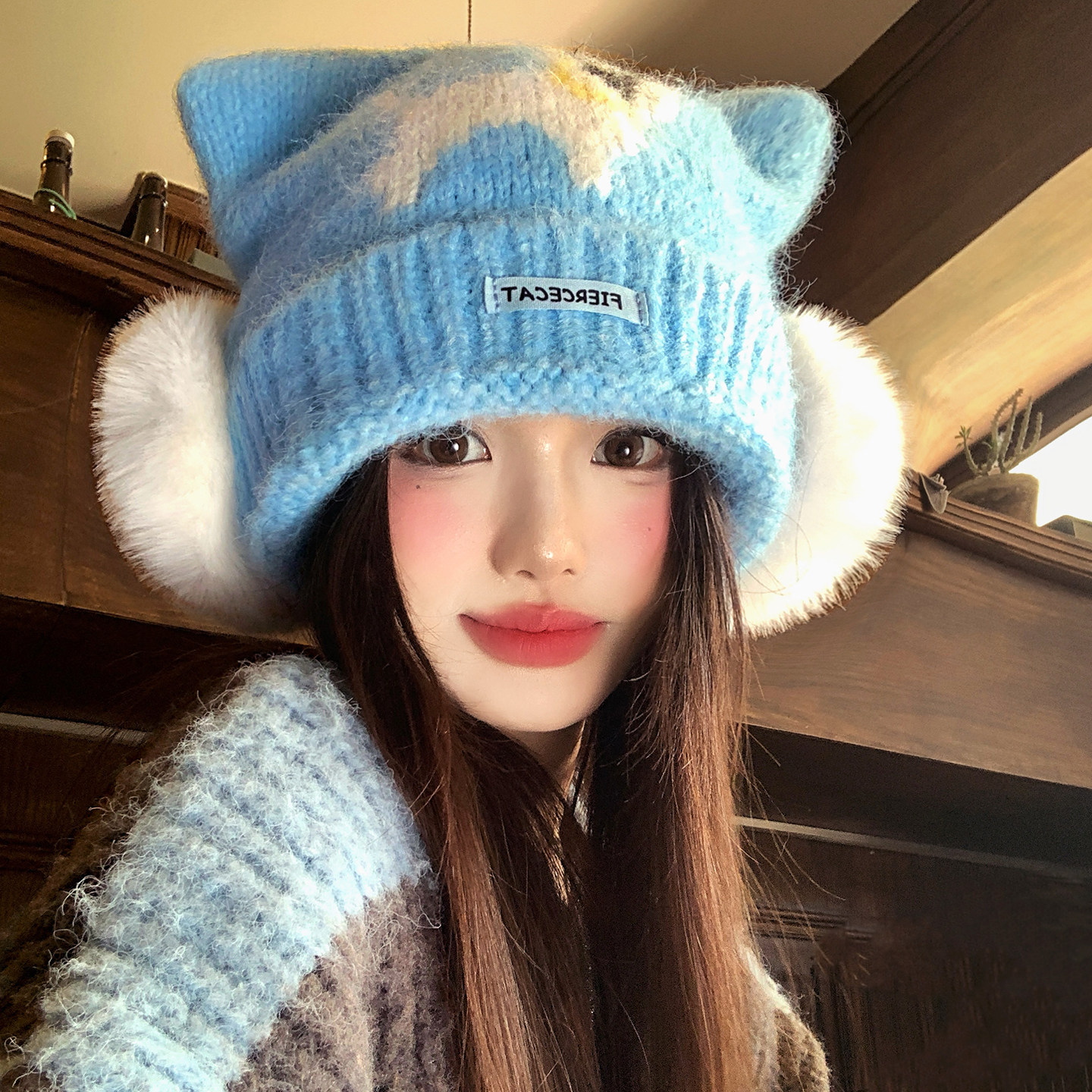 蓝色可爱小狗毛绒耳罩针织帽女秋冬季显脸小保暖护耳套头毛线帽子