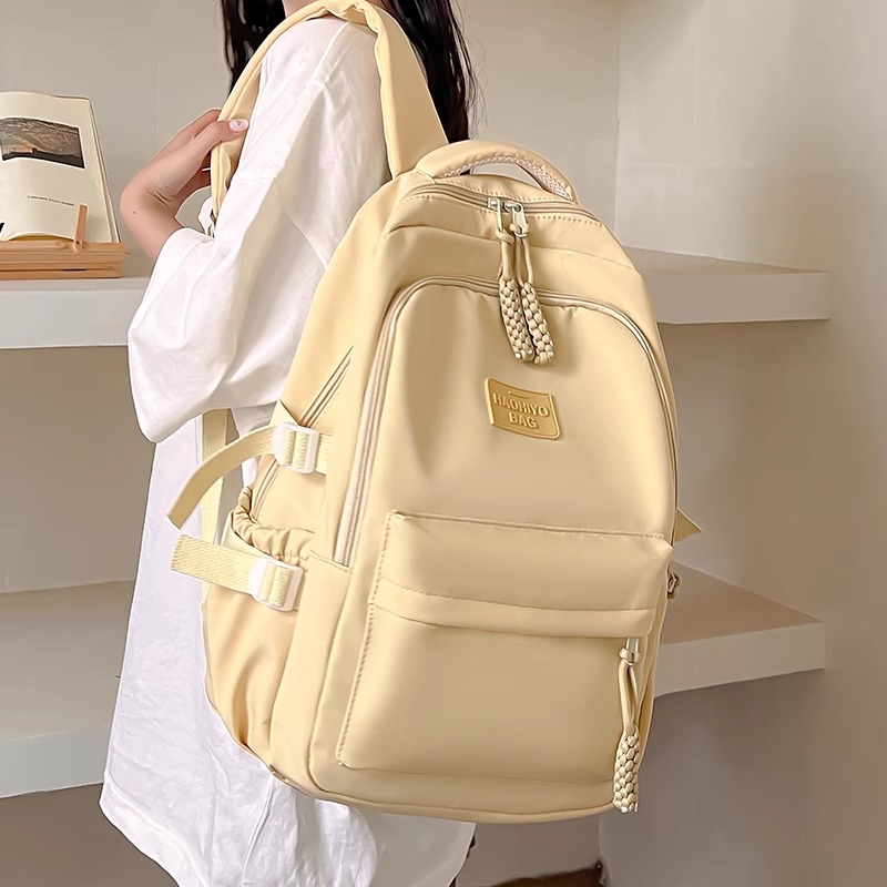 法国ZAMP轻便初中生减负书包女2025新款大容量大学生简约双肩背包