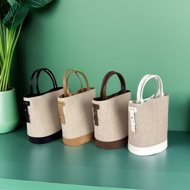 手提水桶包包女2023新款韩版帆布包设计感小众通勤百搭单肩,箱包皮具/热销女包/男包,时尚帆布包,淘宝优惠券,粉丝福利购,淘宝优惠卷