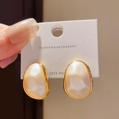 月牙形温柔气质珍珠耳环女简约个性耳饰925银针复古高级感耳环