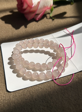 和田玉藕粉冰底起荧光圆珠手串