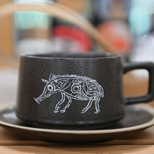 发现河姆渡猪纹粗陶咖啡杯