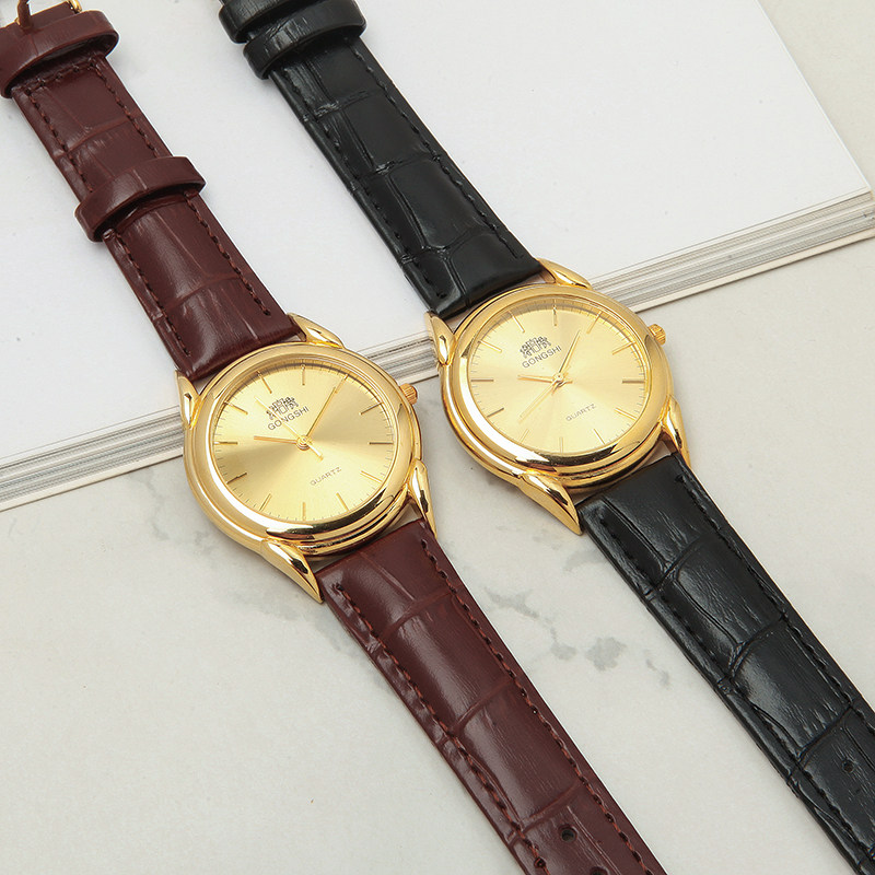广东产老宫狮牌极简大气圆形镀金真皮表带石英表库存全新
