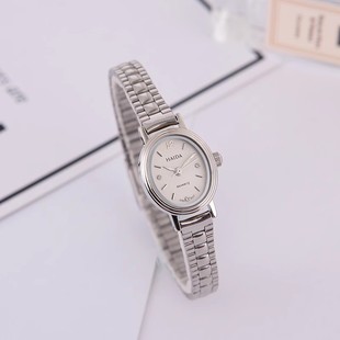 海达手表椭圆精钢镀金复古迷你女石英表库存全新