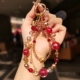 精品手作串珠手机链挂件女ins招财水晶金珠饰品超好看轻奢小众精致高级感短户外旅游行电话套壳手机挂绳新款