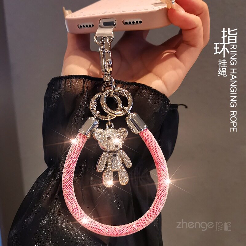 网包闪钻小熊指环手机挂绳ins时尚女超好看小众精致高级感吊饰挂包钥匙扣户外旅游行防丢防盗套壳拇指挂件新