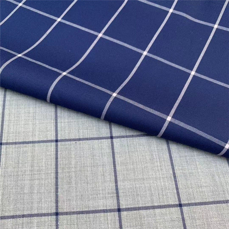 山东南山精纺毛料灰色蓝色大格子西服装裤子面料抗皱免烫毛涤布料