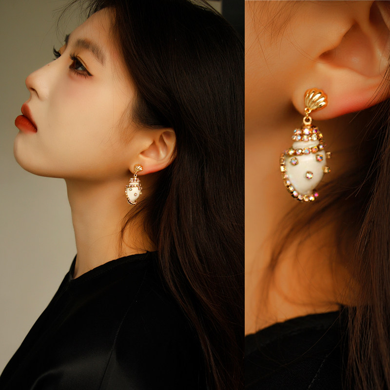 度假通勤设计海螺蚊香盘耳夹