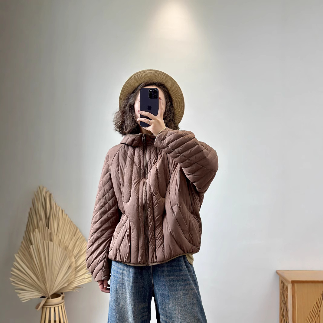 冬平湖设计感韩版宽松连帽羽绒服女短款加厚保暖白鸭绒