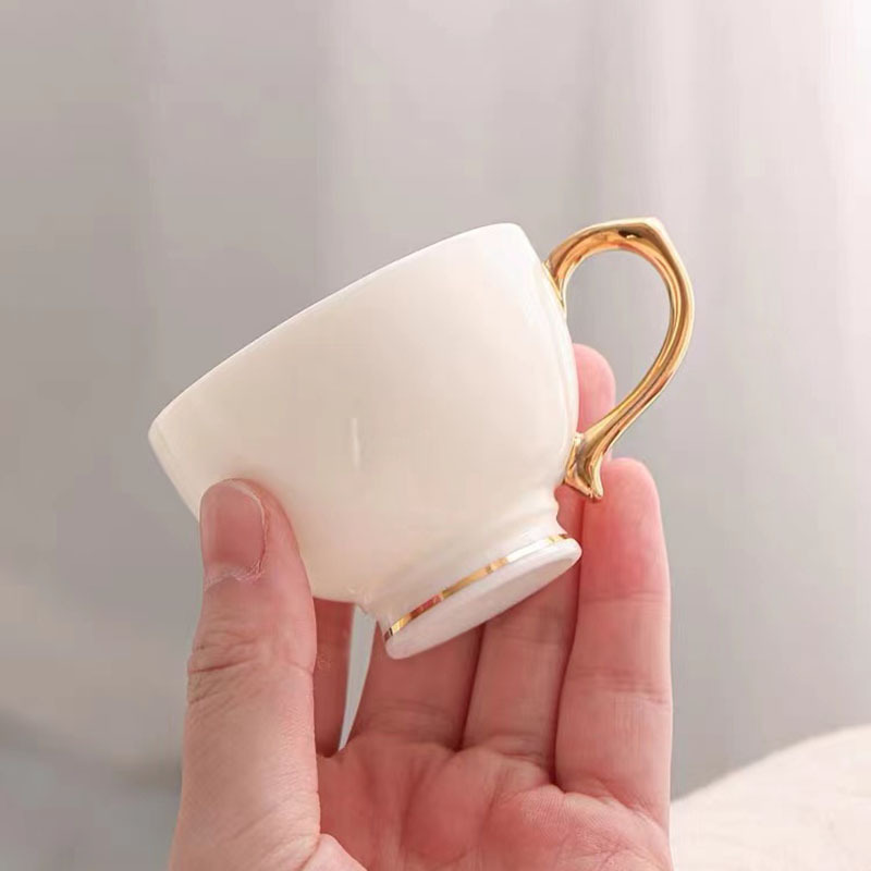 轻奢创意带把茶杯防烫羊脂玉功夫茶具小杯子陶瓷家用高白瓷主人杯