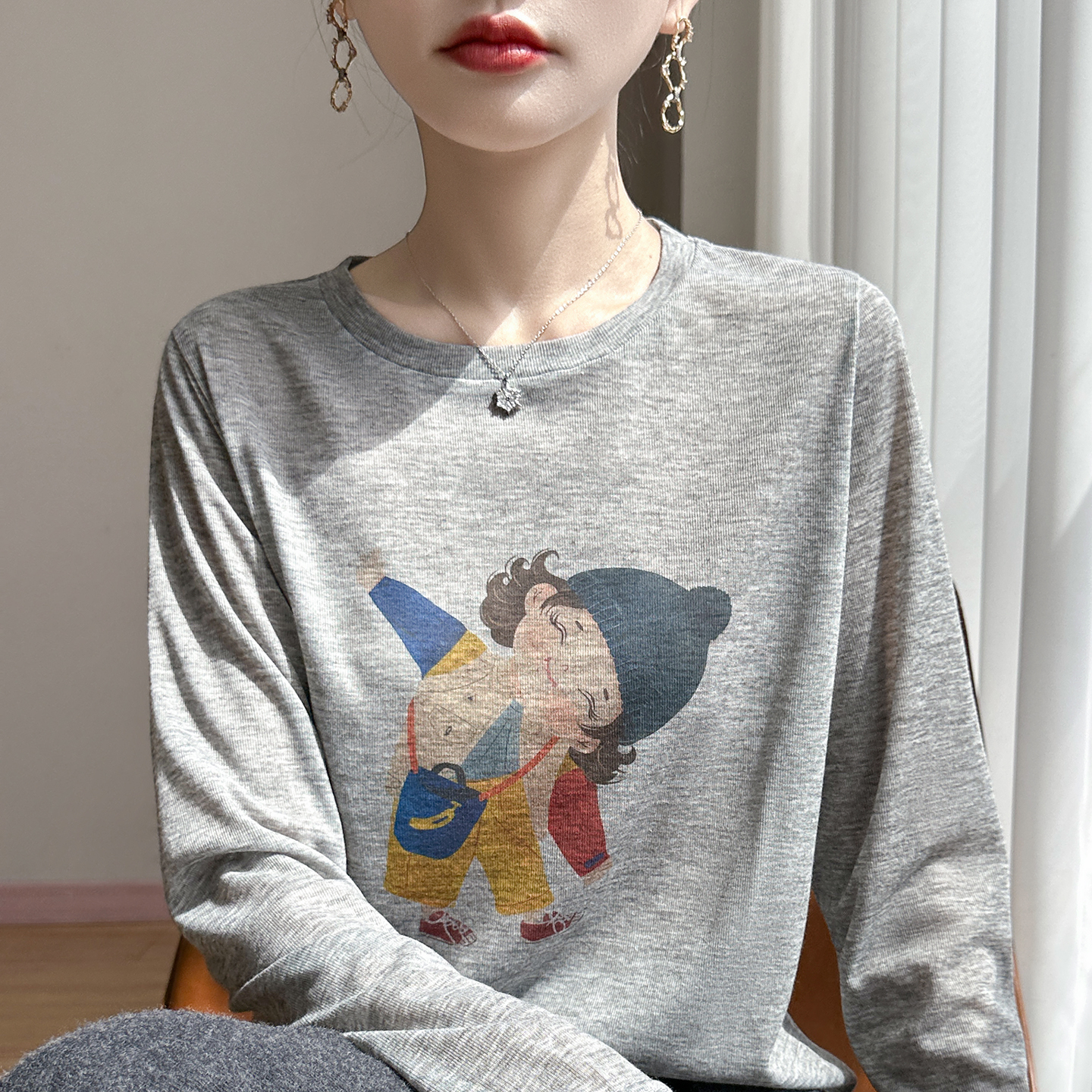 2025秋冬新款圆领羊毛针织衫女宽松印花上衣百搭通勤羊绒打底毛衣