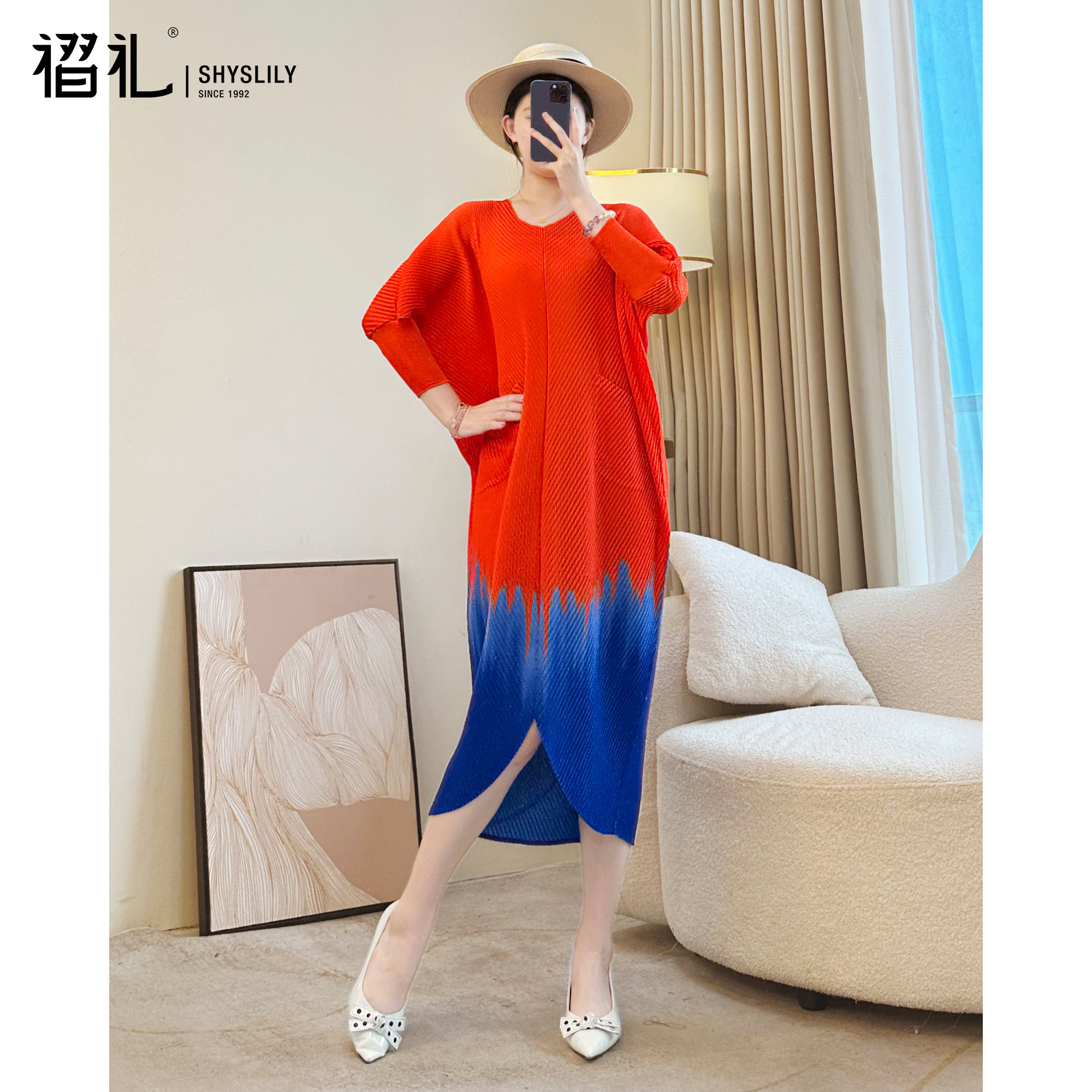 高级感三宅连衣裙女2026春季橘色薄裙子显瘦气质宽松褶皱中长裙