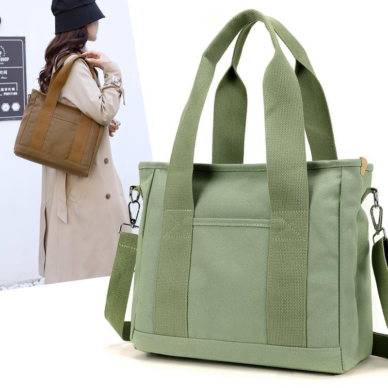 新款帆布手提袋多分隔层妈咪包外出带娃上班手拎便携女单肩托特包