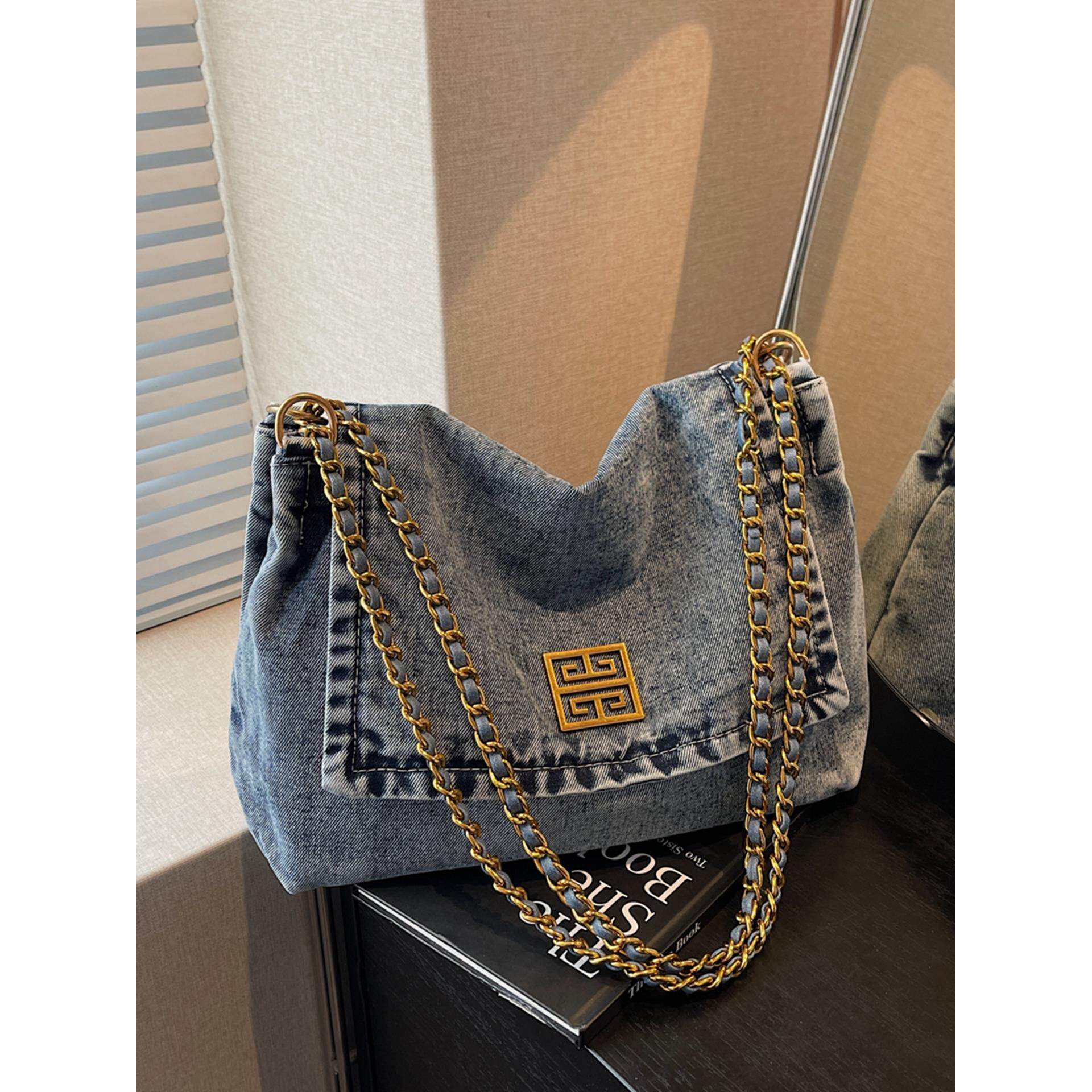 休闲通勤大容量牛仔布包包女式2026新款高级感链条单肩斜挎托特包