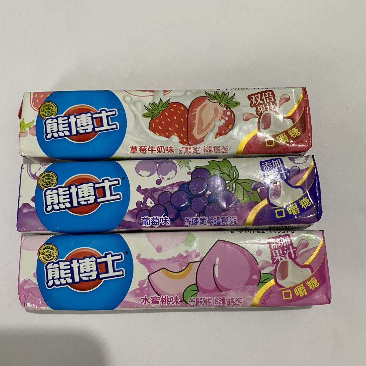 临期D22 熊博士口嚼糖52g葡萄味蜜桃水果味糖果酸条软糖儿童零食
