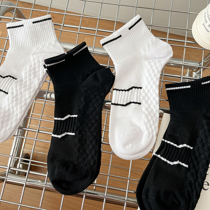 黑白色按摩底运动中筒袜男款透气吸汗女短袜跑步篮球防臭春夏防臭