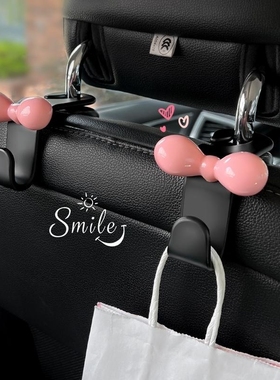 红色蝴蝶结汽车椅背挂钩创意高级感可爱车载收纳2024新款