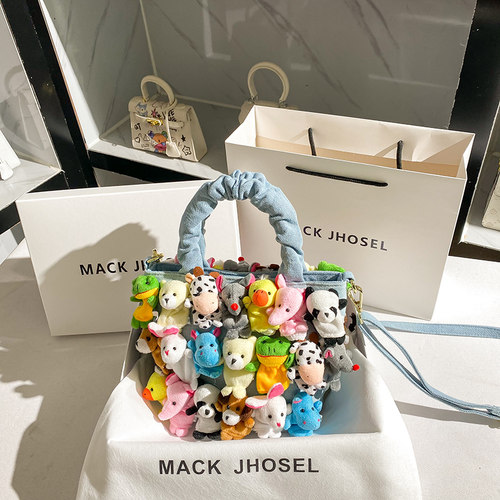 香港mackjhosel真皮水桶女小公仔