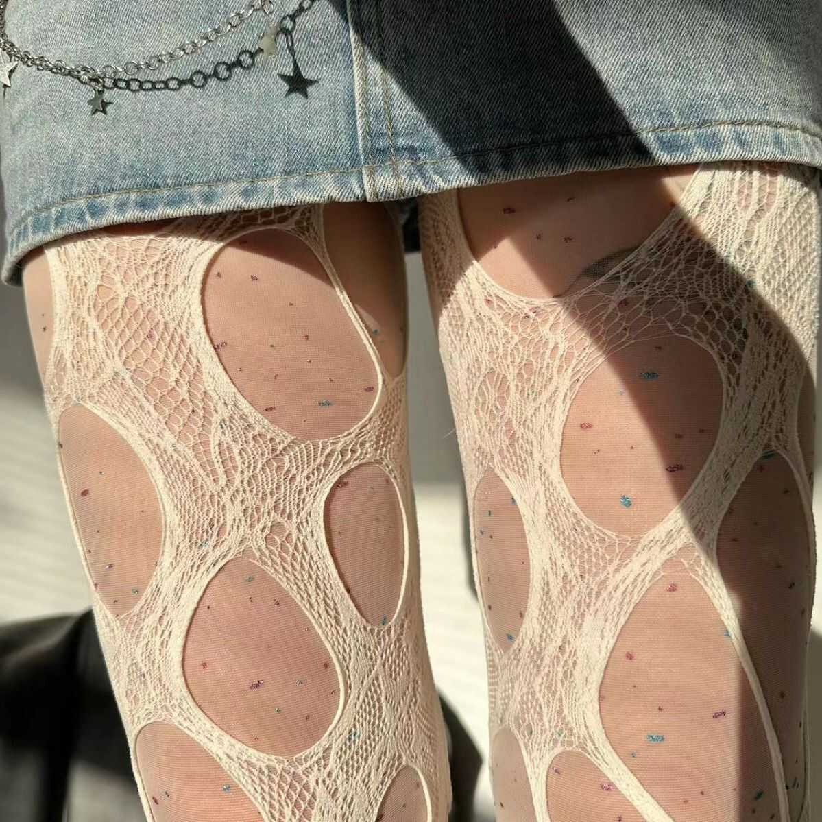 丝袜黑色打底破洞辣妹