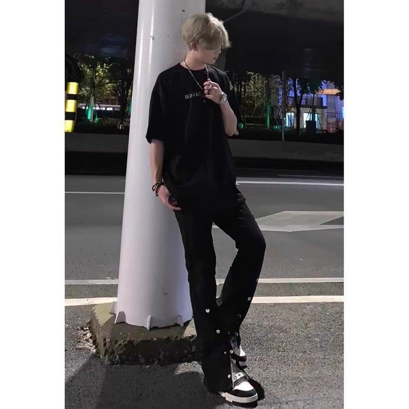 黑色排扣童装牛仔裤男开叉微喇长裤中大童设计感高级美式复古高街
