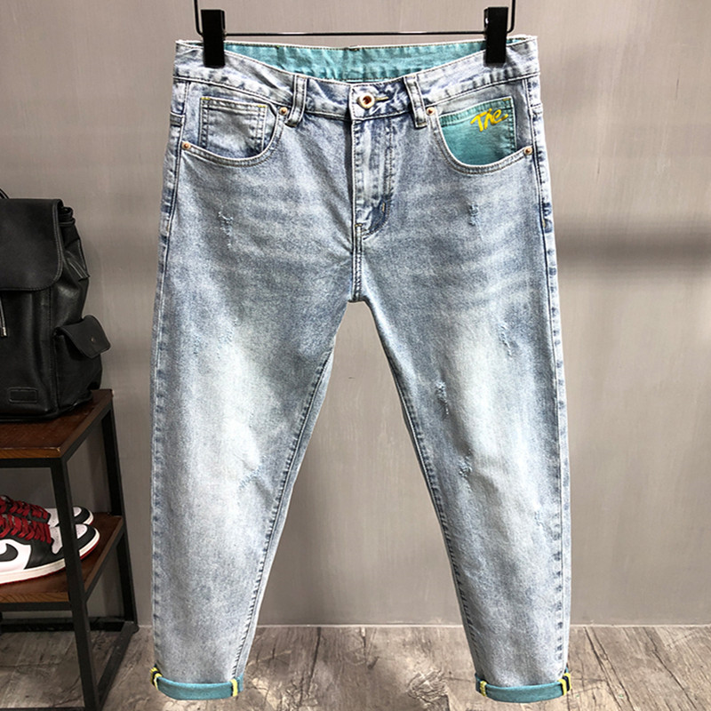 春夏季薄款浅蓝色牛仔裤男拼色刮烂微哈伦小脚裤韩版潮流九分裤子