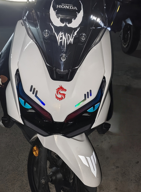 适用五羊本田NWT150摩托车头拉花恶魔夜光眼睛贴纸风挡改装饰版画