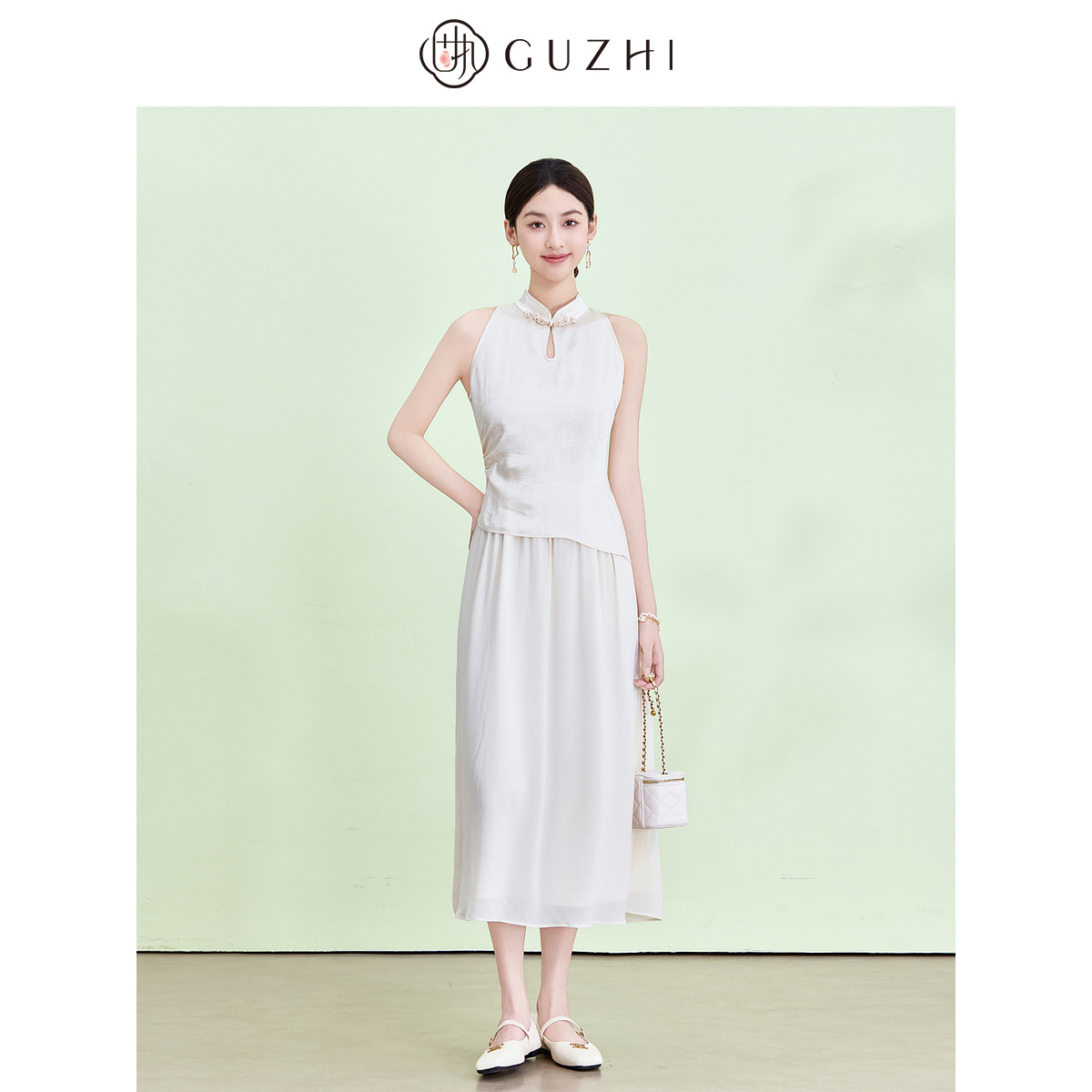 固执2026夏季新款新中式杏色立领盘扣温柔风长款连衣裙女