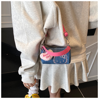 新品！是kitty！真的很难不心动～圆筒手提牛仔hellokitty包包