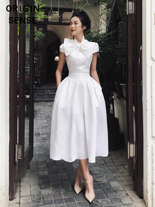 纯白色大蝴蝶结立体装饰气质赫本公主风大摆蓬蓬连衣裙白色小礼服