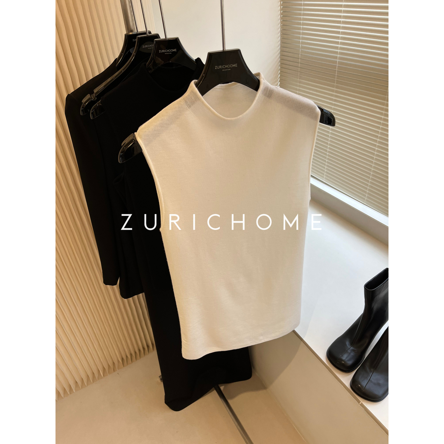 赫夲气质半高领无袖羊毛针织打底