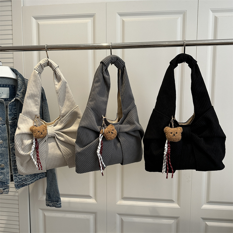 芊舒祺灯芯绒托特包女2025新款蝴蝶结小熊挂件百搭通勤手提单肩包