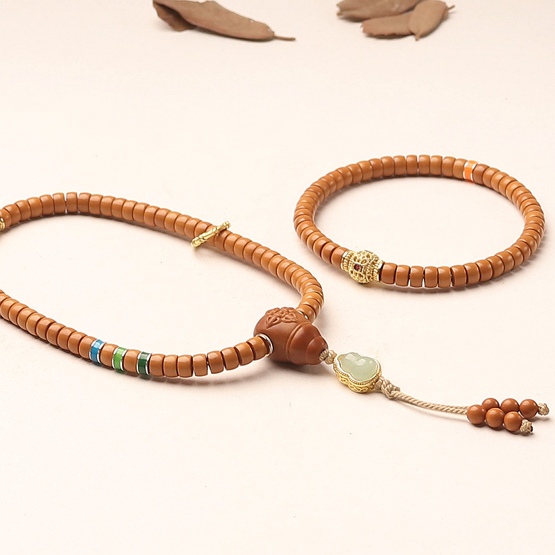 手持橄榄核清水核尖雕刻直切桶珠三通同轴文玩手持转运绕指柔