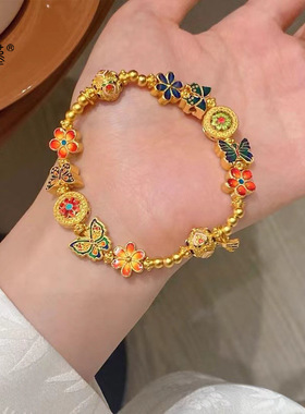 女歌手演员沙金花丝蝶舞烧蓝珐琅彩蝴蝶手链黄金色复古手串女