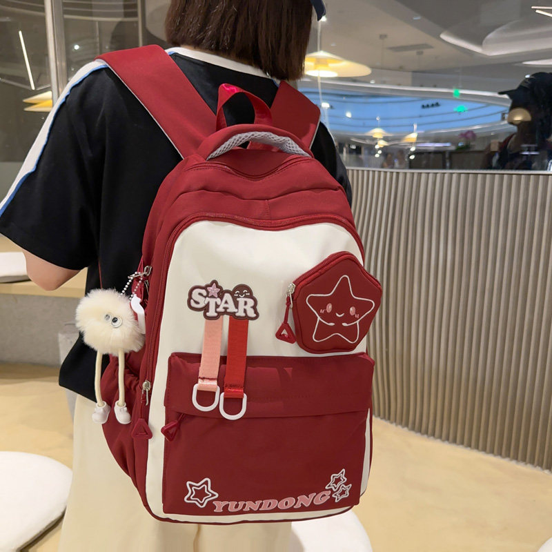 小学生书包女韩版三到六年级儿童减负双肩包大容量初中生背包女生