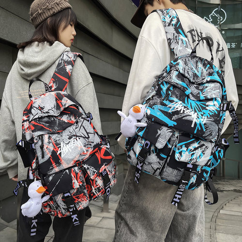 潮酷书包男初中生韩版高中大学生印花女生背包潮牌旅行双肩包男生