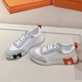 Off-White with Orange Lettering