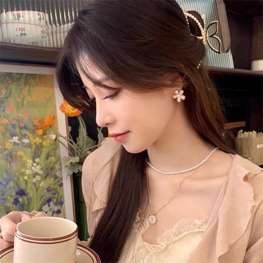 新款时尚简约大方珍珠猫眼石花朵耳钉纯银耳针