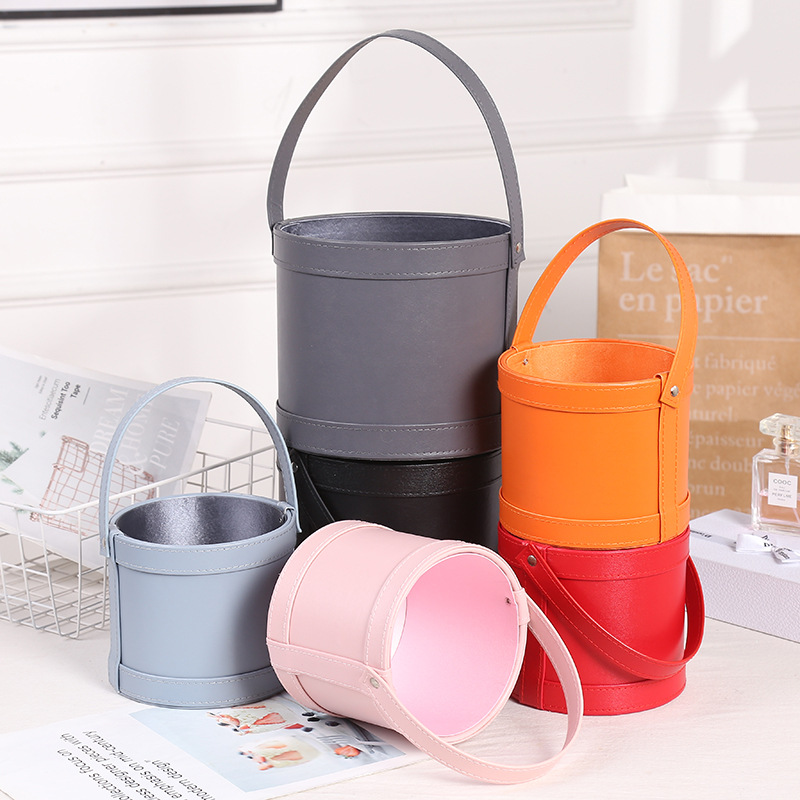 手提圆形皮质圆桶包装盒