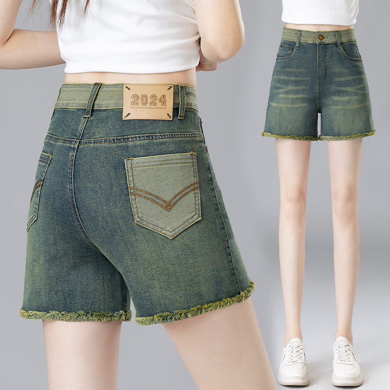 翡翠绿高腰毛边牛仔短裤女夏季图片