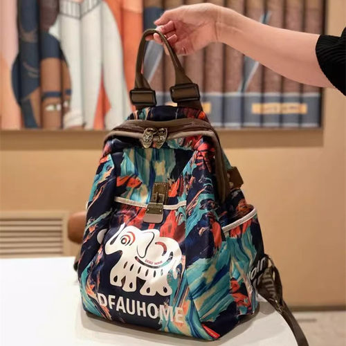 轻便民族风牛津布女士双肩包中老年妈妈防盗女包刺绣古风旅行背包