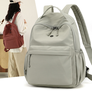 牛津布双肩包女2026新款 轻便旅游书包男旅行女士防水通勤背包 时尚