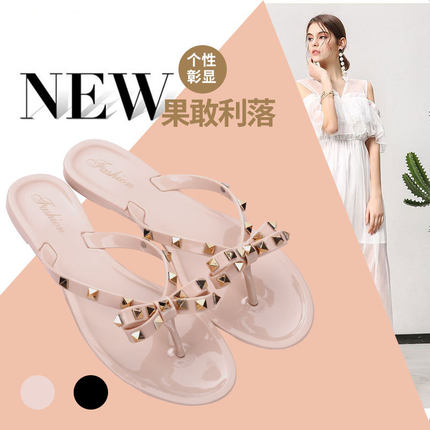 时尚百搭凉拖鞋家居平底防滑2026新款铆钉蝴蝶结人字拖夏季女外出