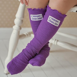 哦哦乐韩国童装Bananaj26春款女童贴标弹力中筒木耳边棉袜