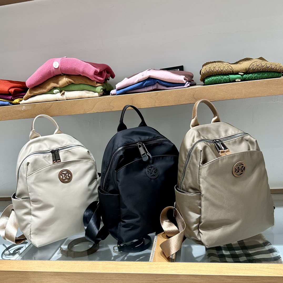 牛津布双肩包女2025新款小众设计感休闲旅游背包防水轻便大容量