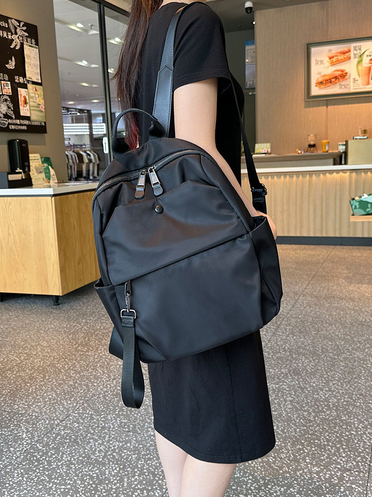 电脑双肩包女2025新款时尚轻便大容量书包牛津布旅行背包通勤女包