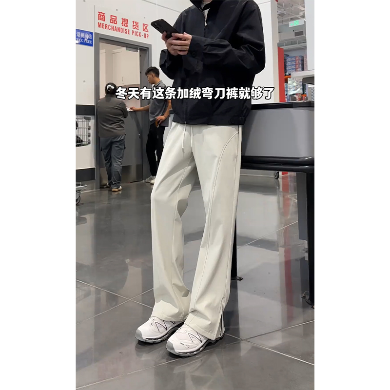 米白色斜切拉链裤脚冲锋裤男