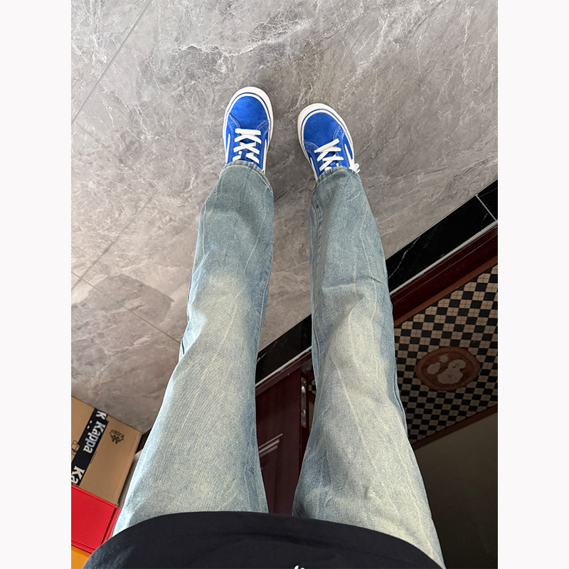 水洗做旧蓝色闪电纹牛仔裤